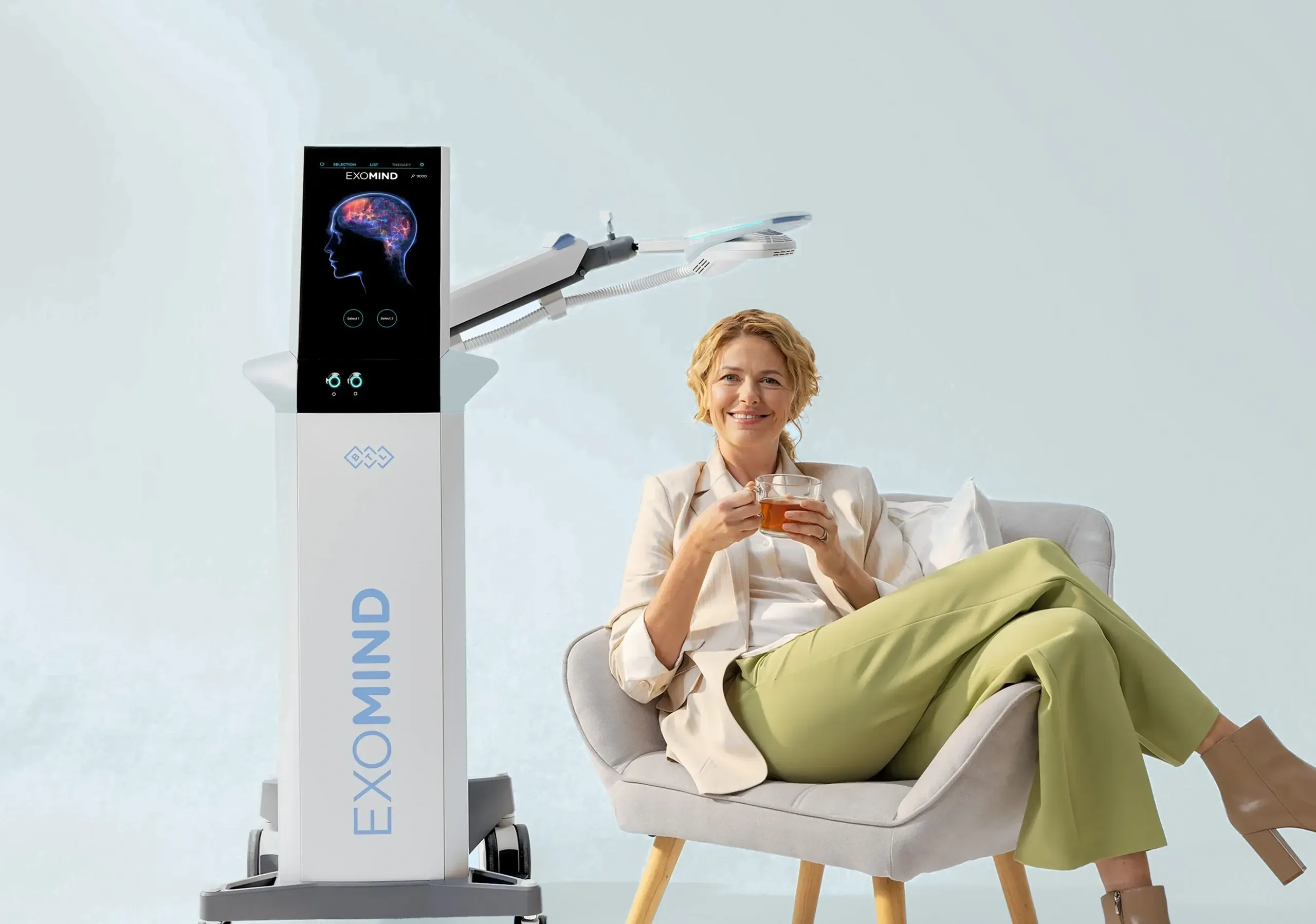 Patient seated comfortably during an Exomind TMS therapy session at a non-surgical clinic in Camarillo, CA
